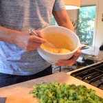 broccoli cheddar cornbread whisking